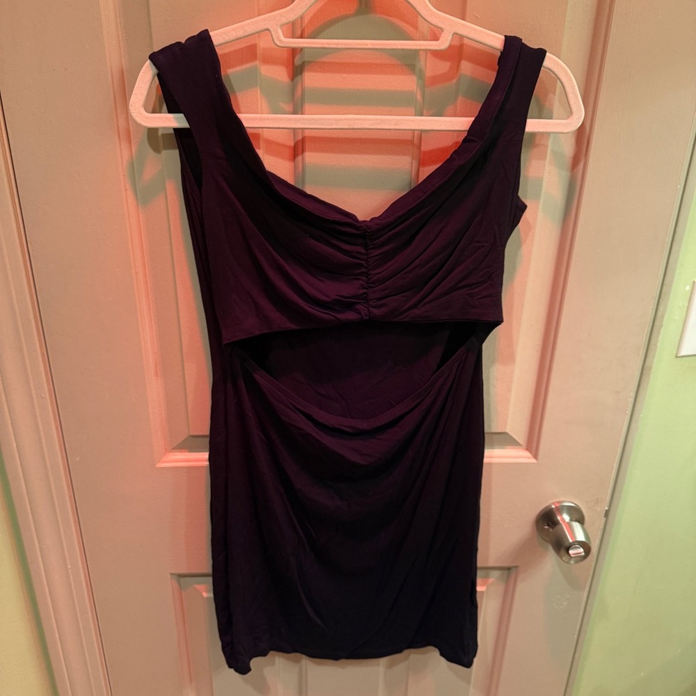 Mini black bodycon dress with front cut out